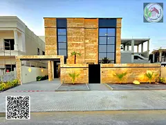 A villa with a distinctive design in the Al Alia area with a large area, central air conditioning, i