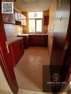 Two bedrooms and a living room for annual rent in Al Nuaimiya 1-2 bathrooms, balcony, and a large ki