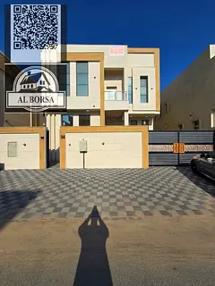 Villa for sale in Al Zahia area, consisting of five master bedrooms, a living room, a hall, a kitche