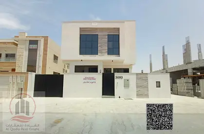 For sale, a villa in Ajman, Al Yasmeen, 5 master bedrooms, a living room, a hall, and a maid's room. Freehold for all nationalities, with the possibil