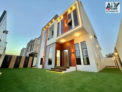 Own a villa with no registration fees, 4 bedrooms, central air conditioning, one minute from Sheikh Mohammed Bin Zayed Road