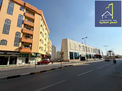للبيع بناية زاوية علي شارع عام بدخل فوق 9.5% لقطة
