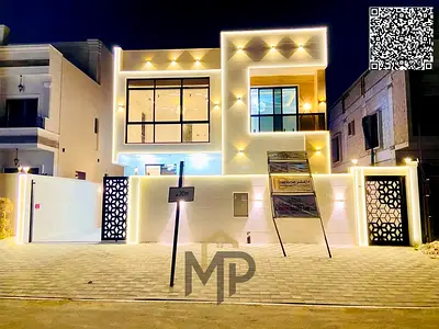 Luxury villa for sale opposite Sheikh Mohammed bin Zayed Road with a private pool, freehold for all nationalities, distinguished payment facilities an