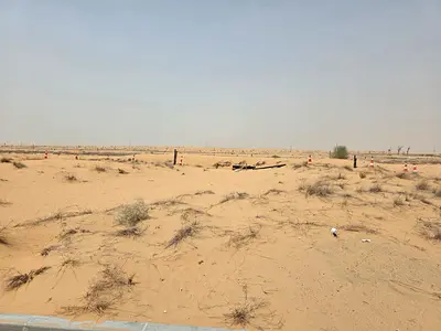 للبيع قطعة ارض تجارية بإمارة الشارقة بمنطقة حى الدبدبة شمال ضاحية الرحمانية