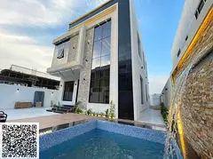 Luxury villa for sale with a swimming pool in Al Yasmin, Ajman | 3 master bedrooms + majlis + living