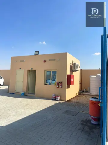 Best location in Al Sajaa: Corner plot for sale on two paved streets, one 97 meters wide and the other 60 meters wide.