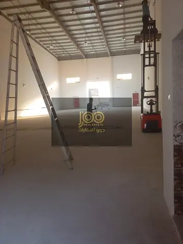Warehouse for rent in Umm Al Quwain, Umm Al Thu'ub area. It features a prime location suitable for storage or commercial activity.