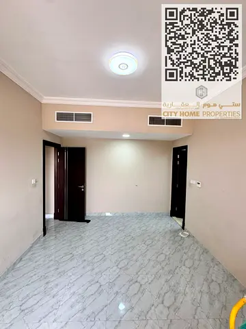 شقه غرفتين وصاله مساحه كبيره بالروضه 3بالقرب من مخرج دبي وشارقه مبني عائلي راقي بالقرب من جميع الخدمات منطقه راقيه