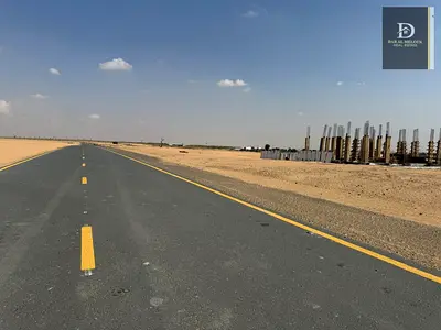 ارض سكني للبيع في الشارقة / روضة القرط على شارع 54