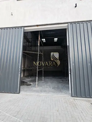 Warehouse for rent in Al Jurf Ind. 3, 3,000 sq.ft with mezzanine, 12m height, 62 kVA power, dual-side road, AED 175k