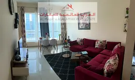 A fully furnished one-bedroom apartment in Al-Taawun for monthly rent with internet