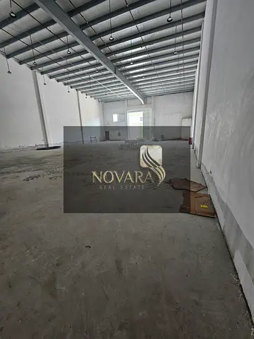 5500 sq ft warehouse on a main street in Al Jurf Industrial Area 3, 50 kW electricity, priced at 385,000. A prime location for your business.