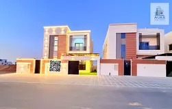 Villa for sale in Al Bahia area, Ajman. Five master bedrooms, excellent location, freehold ownership