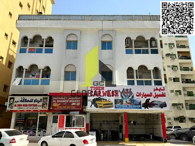 مبنى تجاري وسكني مكون من طابقين (أرضي + طابقين) للبيع في المنطقة الصناعية الثانية بأجمان، مساحة الأرض الإجمالية 4264 قدم مربع، السعر المطلوب صافياً لل