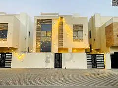 Two-story villa with a rooftop for sale at an attractive price opposite the mosque, including regist