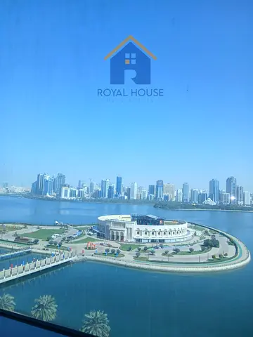 2 BR Oasis in Al Dana Tower: Stunning Water Views