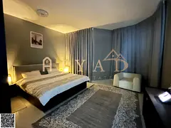 For sale: luxury apartment in Al Khor Towers Ajman, 2 bedrooms, spacious living room, maid's roo