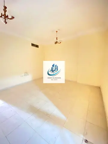 2 bhk spacious apartment in a well mentained building opposite Sahara Center next to al nahda park