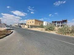 Land for sale in Sharjah, Al Hooshi area, Al Badi' suburb