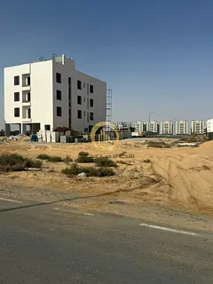 For sale: Commercial land in Tilal Al Sharjah City, prime location opposite the mosque and Victoria