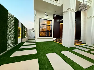 Villa for sale Very premium location Land and first roof Super Deluxe finishes at a special price including registration and ownership fees 2 minutes from Sheikh Mohammed Bin Zayed Road,