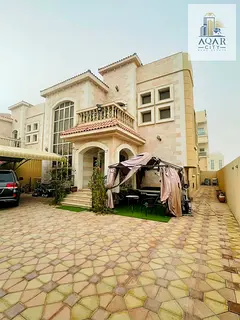 Villa for sale with electricity and water, stone facade opposite the mosque, five master rooms, 5,00