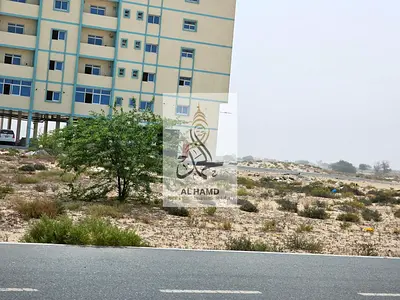 For sale directl owner commercial Corner land G+m+5 near Ajman size 9935sqft
