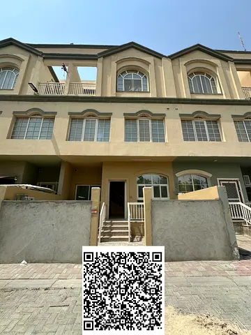 Elegant Three-Bedroom Townhouse with Three Bathrooms for Sale in a Prime Residential Community