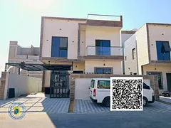 Luxury villa for sale in Al Yasmin area. 6 bedrooms, living room, majlis, and roof terrace. Attracti