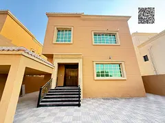 Villa for sale in Ajman, Al Rawda 1 area. Two floors, five master bedrooms, living room, and majlis.
