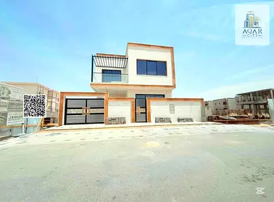 A modern villa, including registration and ownership fees, opposite a mosque, directly behind the park, freehold for all nationalities, at a negotiabl