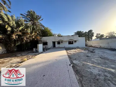 Four-room corner house on a tarred street in Al Ghafia