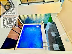 A luxurious villa with a modern design and highend finishes featuring a private pool located in one