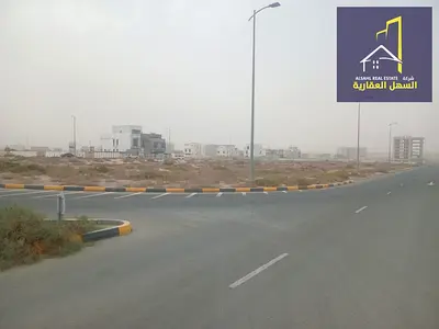 للبيع ارض سكني تجاري في منطقه تلال الشارقه تصريح بنايه سكاني
