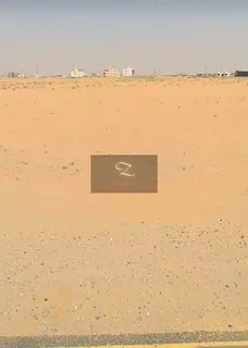 For sale: A plot of land in the Al Zubair Orchards area.