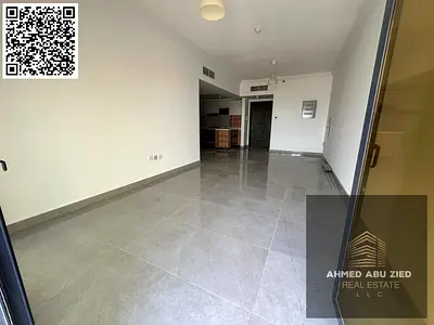 Luxury one-bedroom apartment for annual rent in Ajman, Al Rashidiya 1. Features include a gym, swimming pool, aqua park, balcony, bathroom, and applia