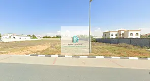 Two Adjacent Residential Plots in Sharjah – Muzairah Prime Location on a 36-meter-wide main road