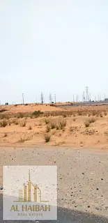 - Residential and commercial lands in the Emirate of Sharjah, prime location opposite Al Yasmeen on