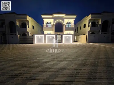 Classic design villa with swimming pool, high-end finishing, registration fees included, located behind Al-Haliou Comprehensive Police Station.