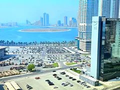 Sea View 1-Bedroom Apartment | Free Parking | Balcony | Close To Dubai Exit