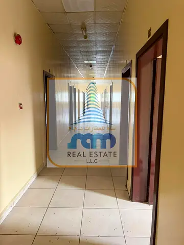 INDEPENDENT 30 Room Labour Accommodation With 10 Car Parking Available For Rent .including all AED 2800/.l