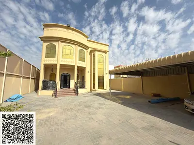Modern villa for sale in Al Muwaihat 1 area - Ajman. Excellent location opposite a park and mosque.