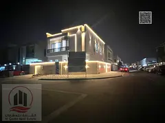 For sale: Corner villa in Ajman, Al Amerah area, 4 master bedrooms, a majlis, 2 living rooms, and a