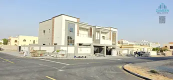 For sale in Ajman, Al Rawda 2 area: a modern villa with central air conditioning (General) and a 5-y