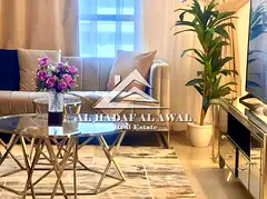 A distinctive apartment for monthly rent in Al Qasba - Beach 2, located within a prestigious reside