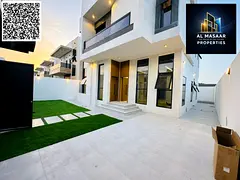 Villa for sale in Al Zahia with a modern design, spacious garden, and price including registration f
