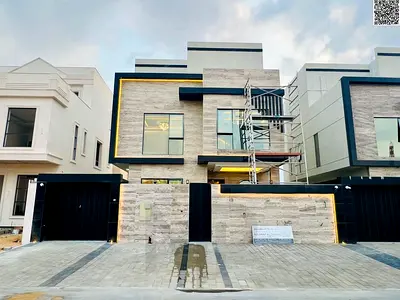 Luxury villa for sale in Al Yasmin neighborhood – 4 master bedrooms with a majlis and two living rooms, registration fees included
