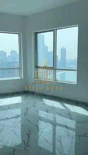 Two-bedroom apartment with a living room for sale in Al Shati Tower 1, with a good view of the sea.