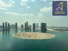 For sale, an apartment in Al Anwar Tower, Al Khan area, with a full view of the lake
