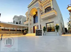 Villa for sale in Ajman Al Yasmeen, 5 master bedrooms, a living room, a maid's room, freehold fo
